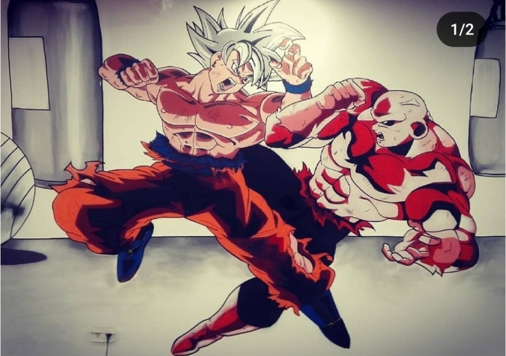 Graffiti mural de Son Goku y Majin Boo en combate, capturando una escena épica de Dragon Ball Z.